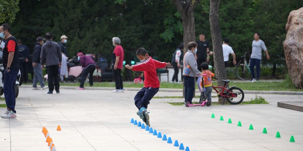 a boy jumping in the air